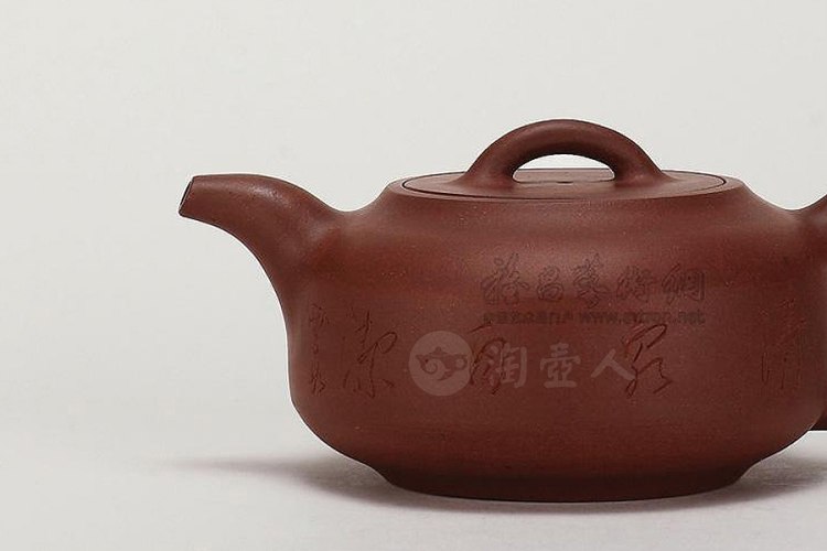 范章恩制平盖圆腹壶